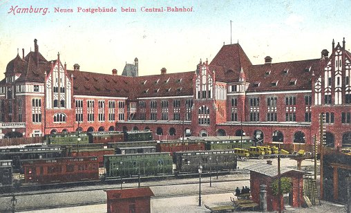 The coloured postcard shows the mail railway sidings and the building of the Main Post Office 1 